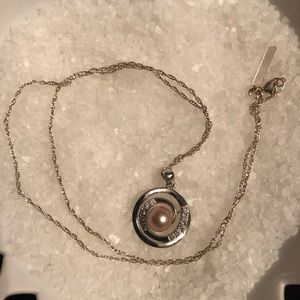 VP retired Center of my universe necklace